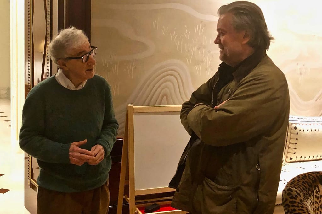 Image showing Jeffrey Epstein and multiple guests seated together at a private table.