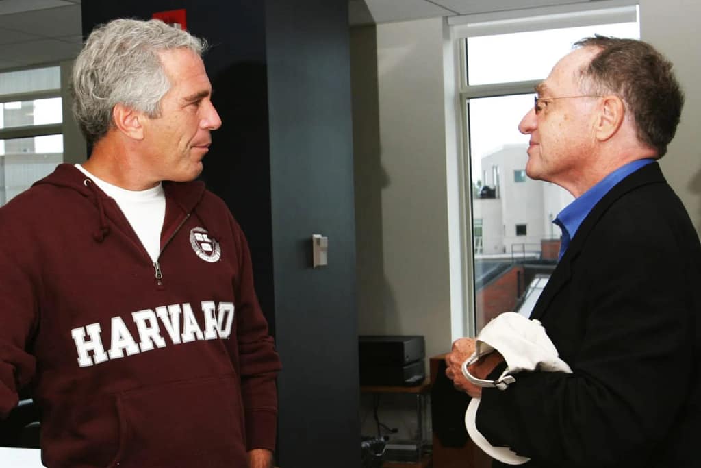 Jeffrey Epstein appearing alongside a well-known political figure in an indoor setting.